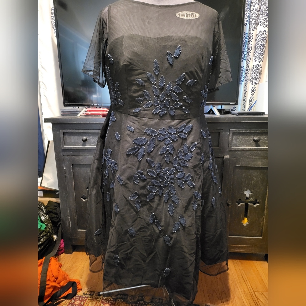 Black applique cocktail dress
